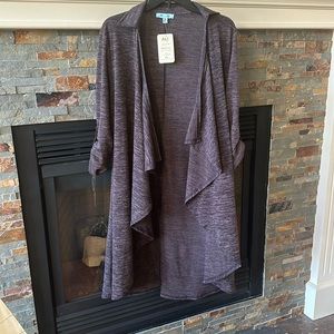 NWT Beautiful long sweater jacket. 3/4 length sleeves with button tab.